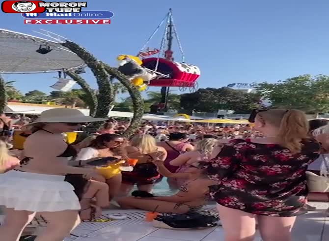 Video :A terrifying moment occurs as an artist tumbles from a decorative carriage that is hung at the club O Beach Ibiza